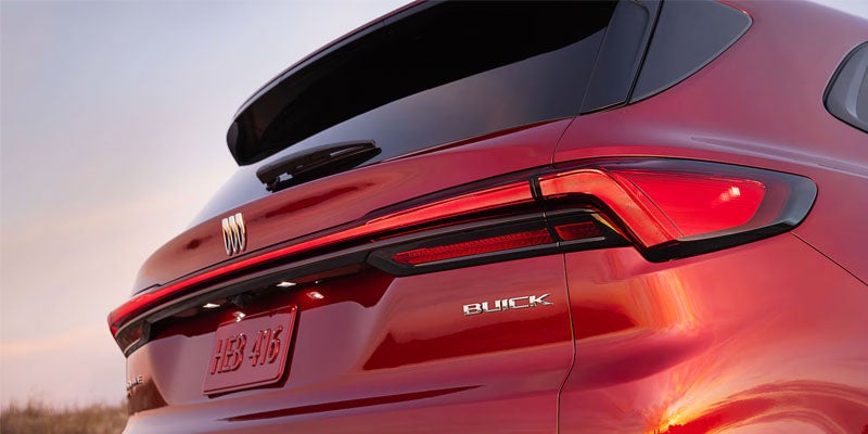 Rear view of the 2026 Buick Enclave showcasing signature LED taillights and modern styling